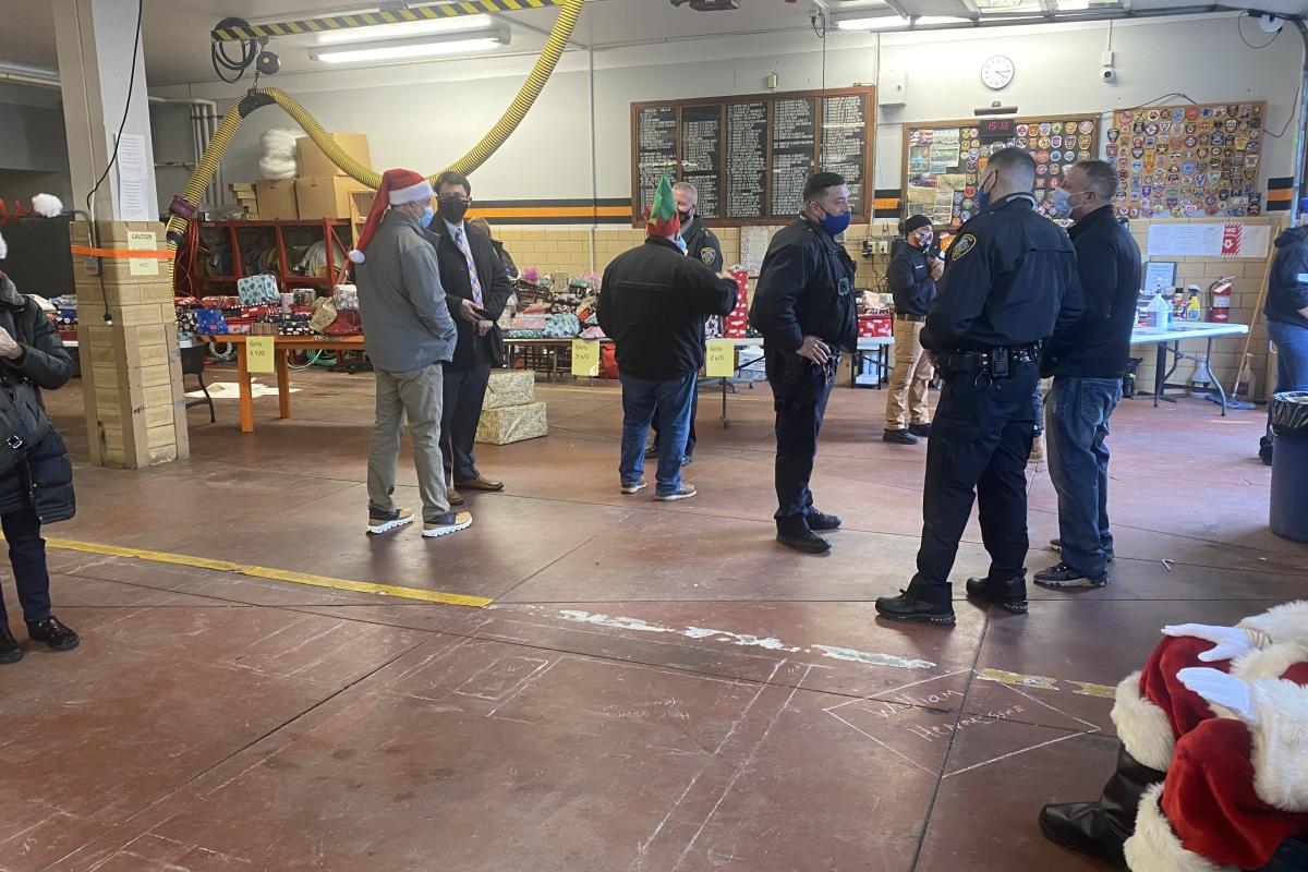 All the officers helping give out toys.