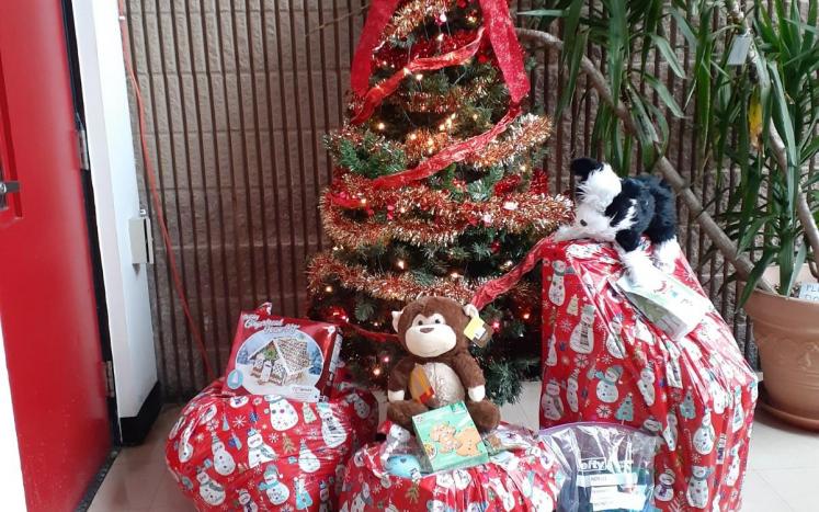 Gifts under the tree at the COC ready for families to pick up.